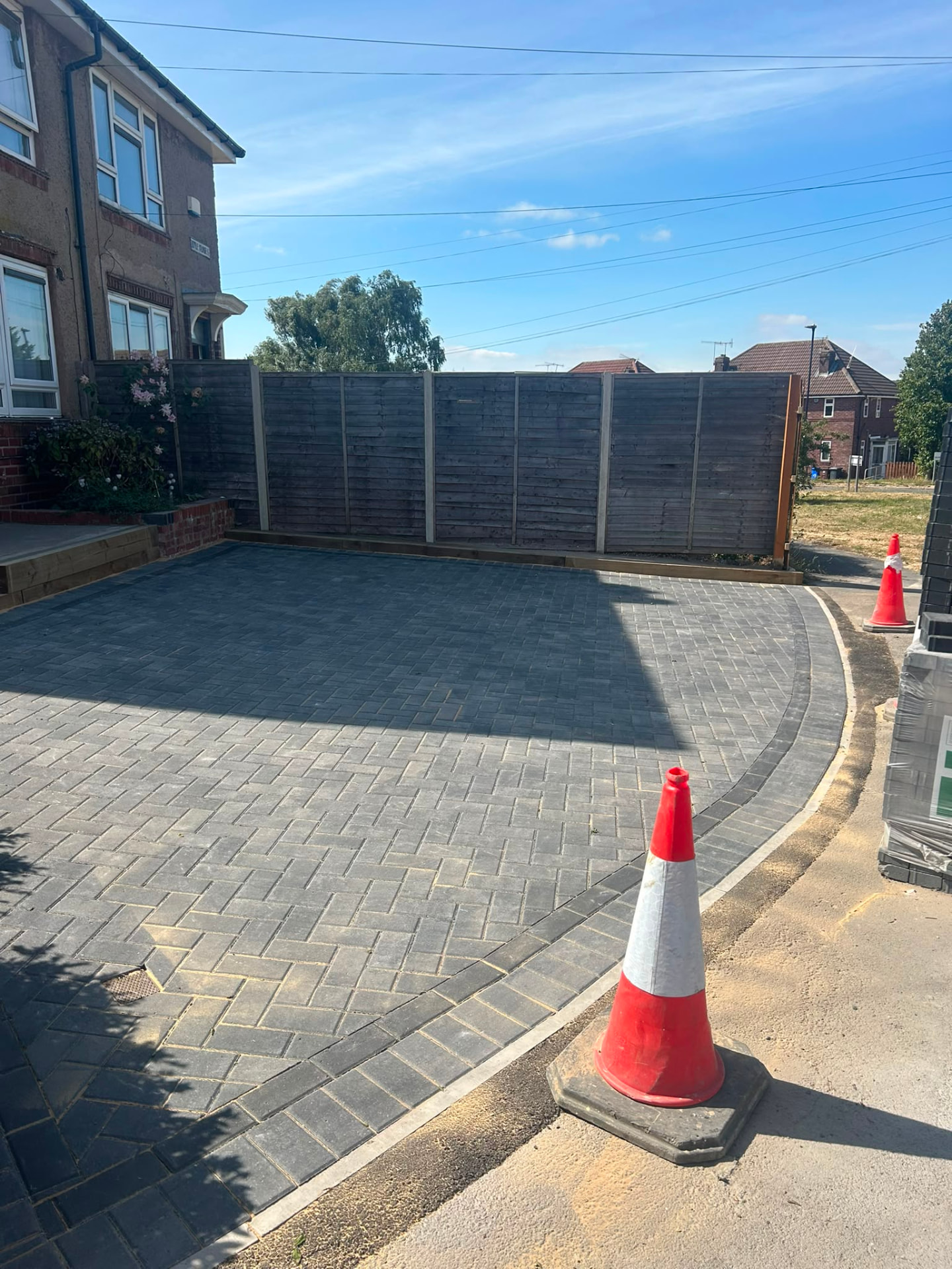 New charcoal block paving driveway
